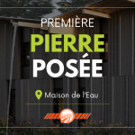 Une première pierre en terre crue posée à La Maison de l'Eau